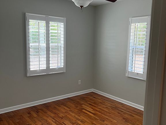 Plantation shutters in bedrooms for privacy.