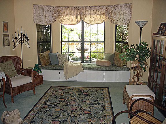 Enjoy the window seat that looks out on the entry courtyard and fountain.