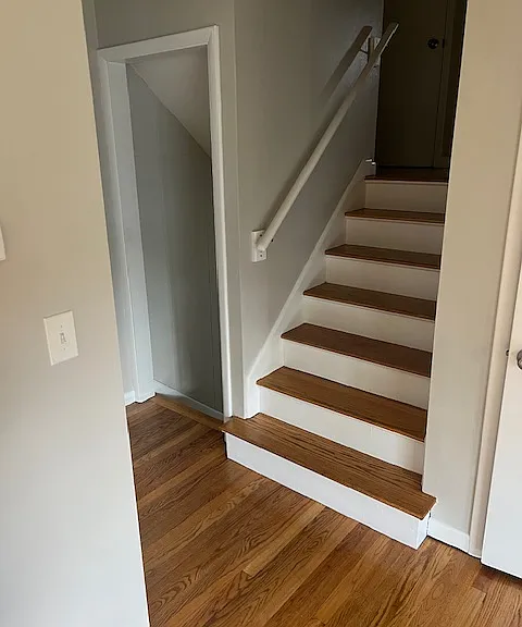 Stairs to upper level and lower level access