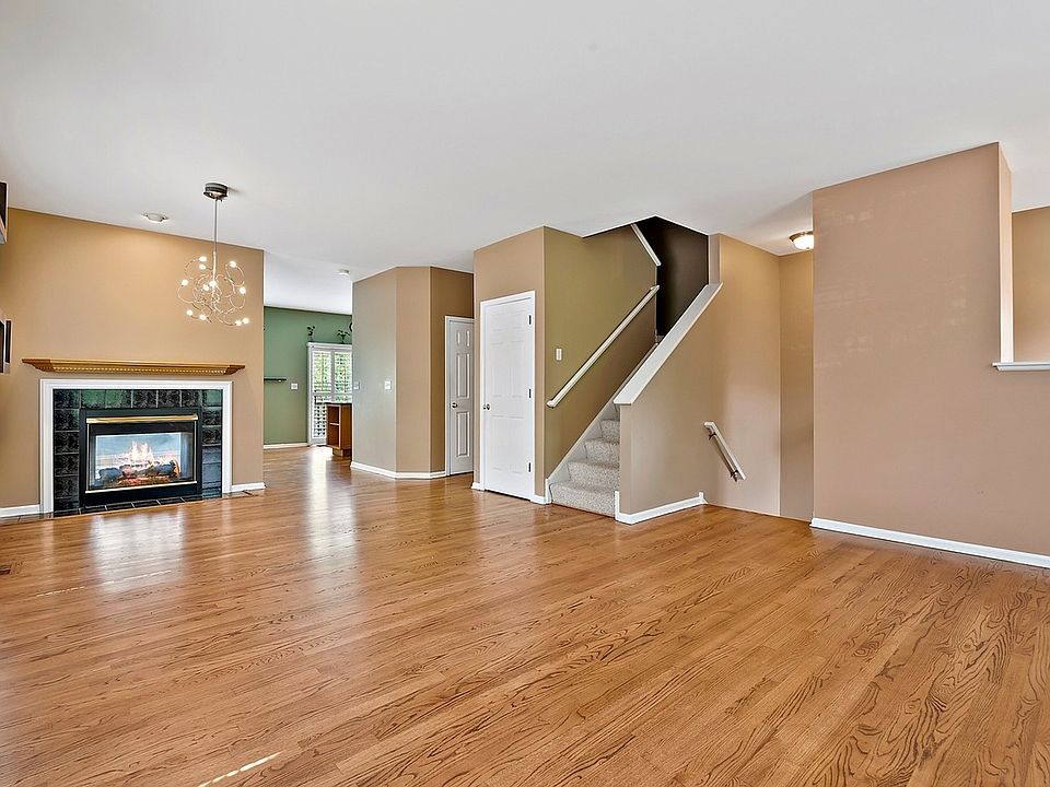 Living Room Main Level with Shared Fire Place with Kitchen
