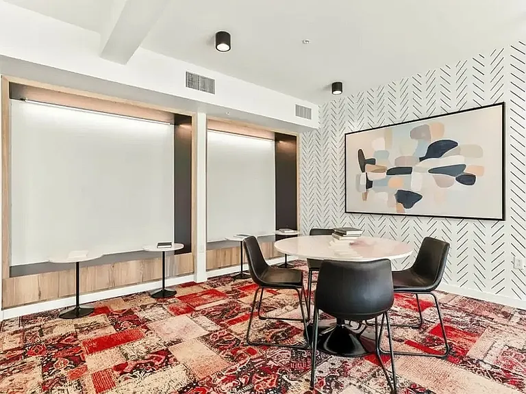 Experience modern elegance in this chic dining area, ideal for intimate gatherings at 805 Riverfront Apartments in Sacramento