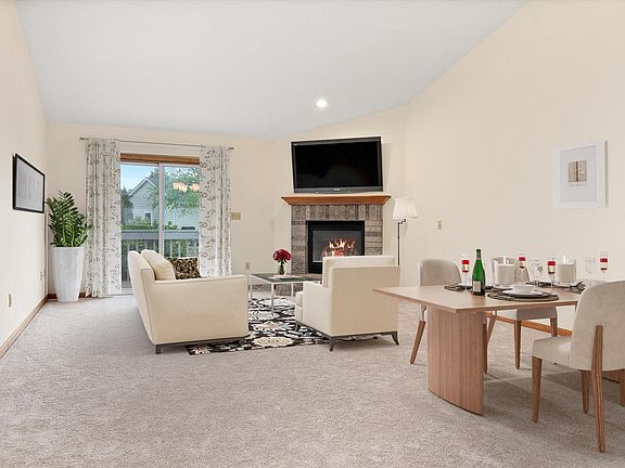 Virtually staged Living Area w/fireplace
