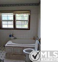 Jetted tub, walk-in shower