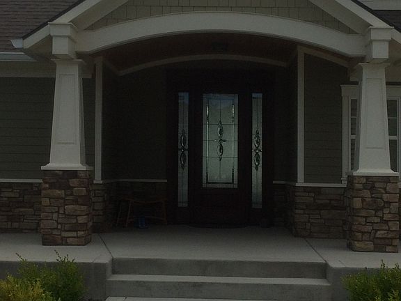 front entry, columns/rock