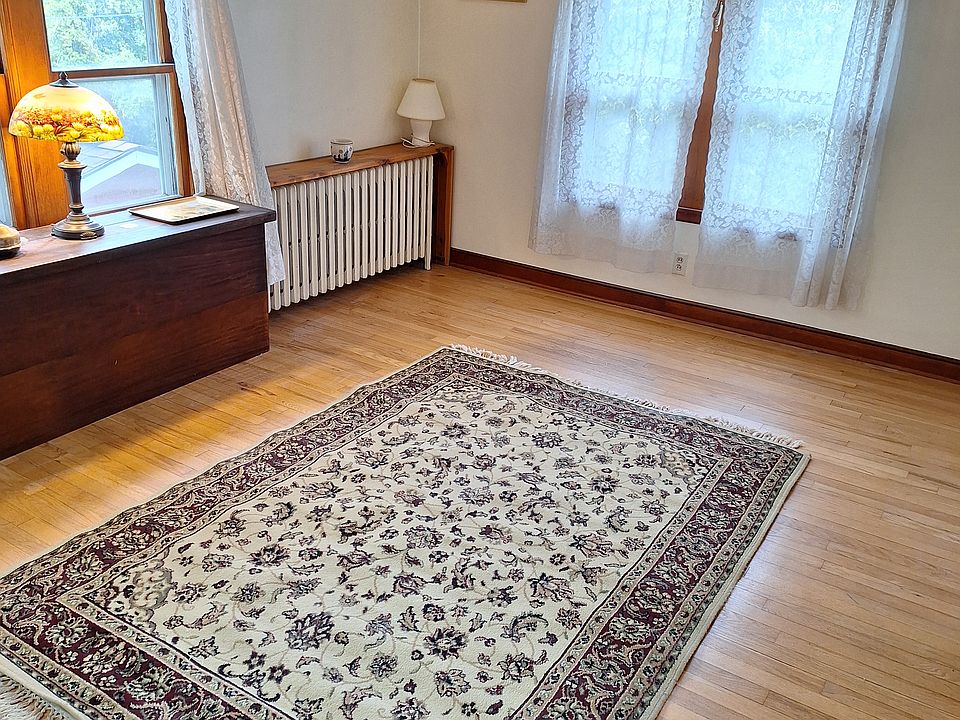 Living room with east and north windows.