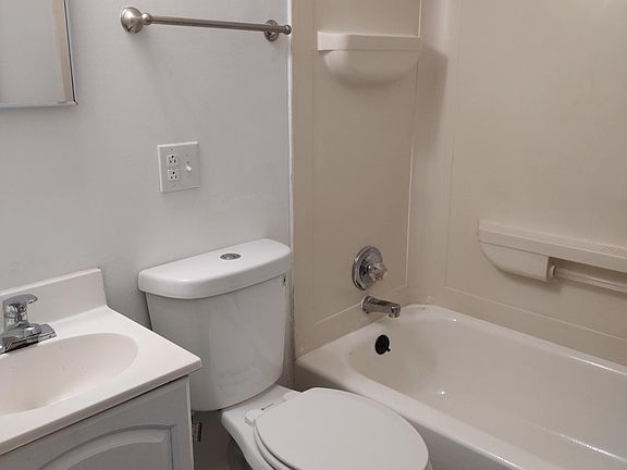 Porcelain tile floor looks like hardwood.