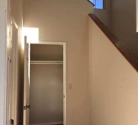 Stairway with large Coat Closet