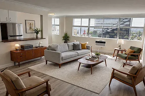 Spacious living area with classic crown molding accents