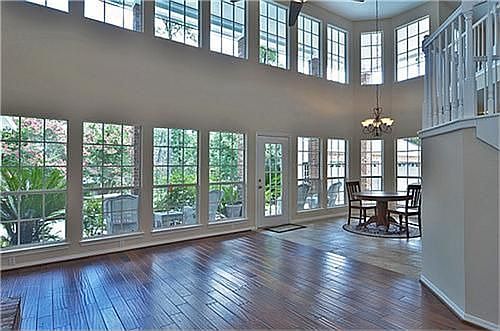 Windows Everywhere!!  This great room is the definition of light and bright, and its all natural!!