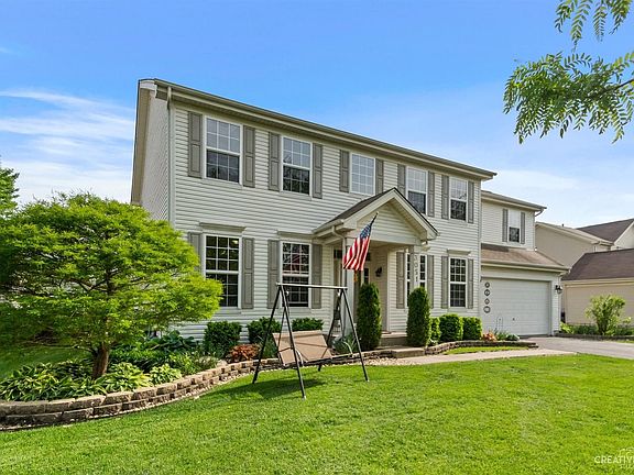 Curb appeal! Beautifully landscaped front yard.