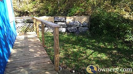 Side yard leading to rear deck