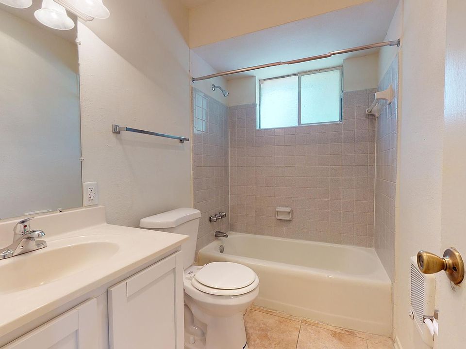 Spacious bathroom with tile flooring