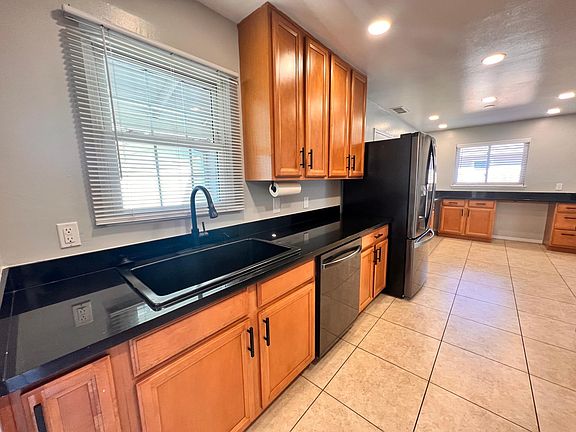 Kitchen With New Plumbing, Hardware and Appliances