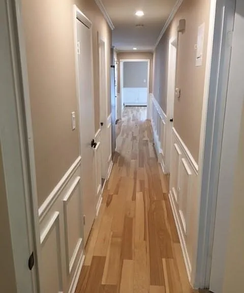 hallway facing towards the kitchen and living room entrance