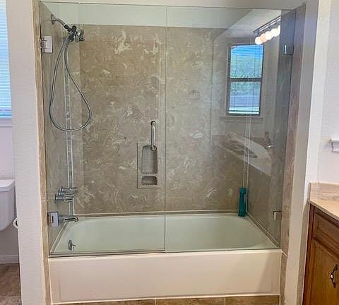 master bath, seamless glass doors, new tile floor, new paint. Huge walk-in closet