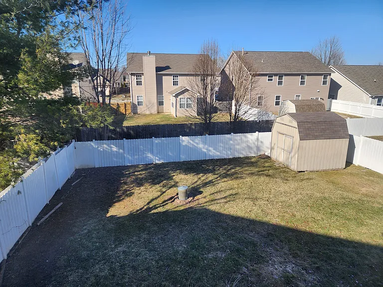 Private, fully fenced in back yard.
Storage barn