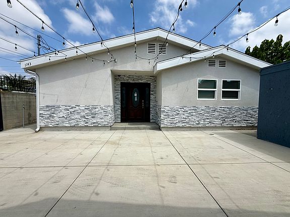 Private courtyard/parking area behind gate. ADU was JUST completed, brand new.