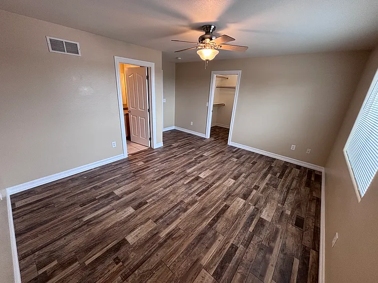 Master bedroom. Walk-in closet and master bath visible.