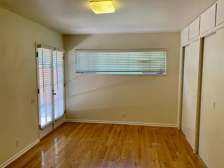 Master Bed with Access to Patio Area