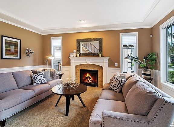 The Living Room features a gas fireplace.