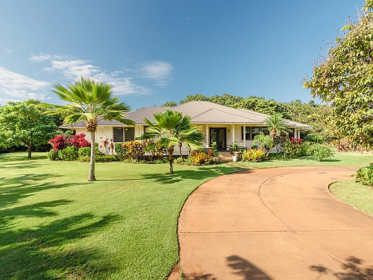 Large Circular Driveway entry and front yard. Garage to right of the home. Please inquire if garage space is needed