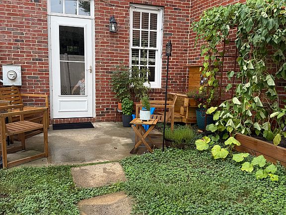 Backyard enclosed by fence