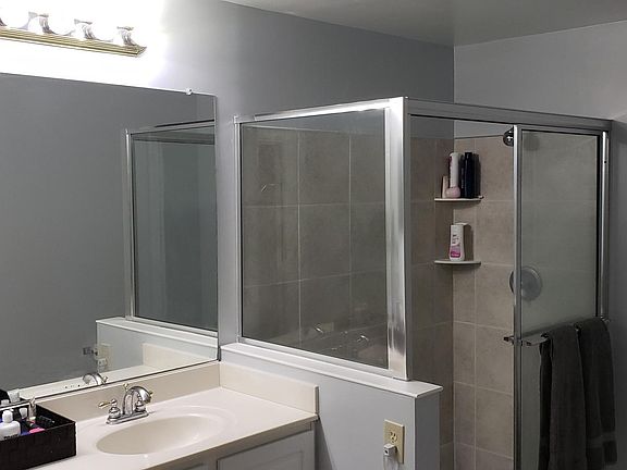 Spacious bathroom; partially renovated with new floor tile