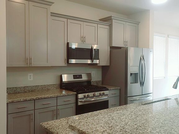 Kitchen with Granite countertops and upgraded appliances