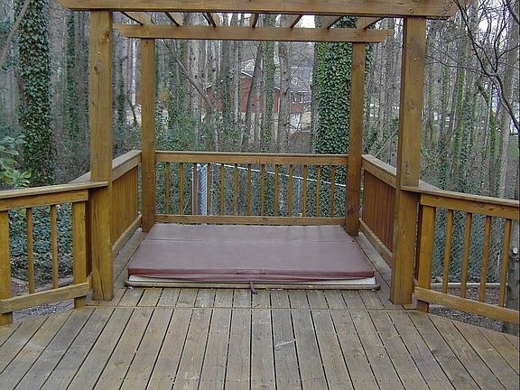 Hot Tub built into extremely well built deck.