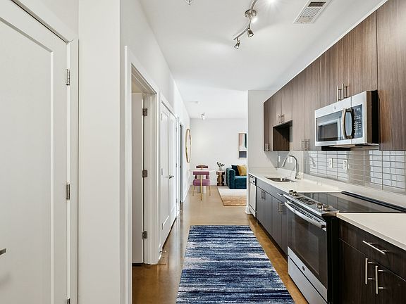 Experience the harmony of style and functionality in this contemporary kitchen layout.
