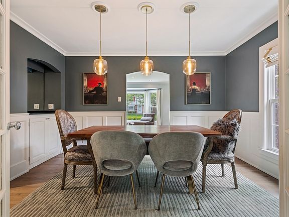 Formal Dining Room with French Doors leading to Family Room.