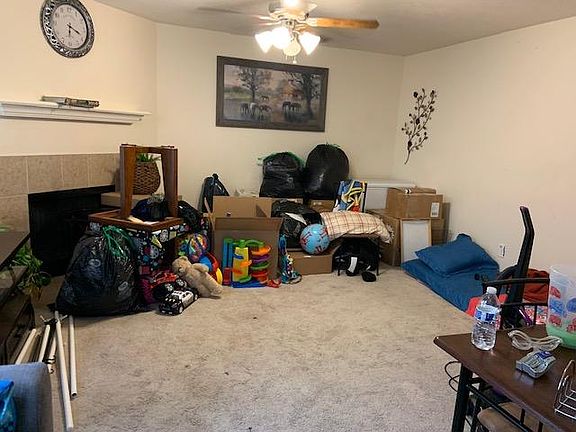 Private Living Area / Fireplace (sorry for the moveout furniture)