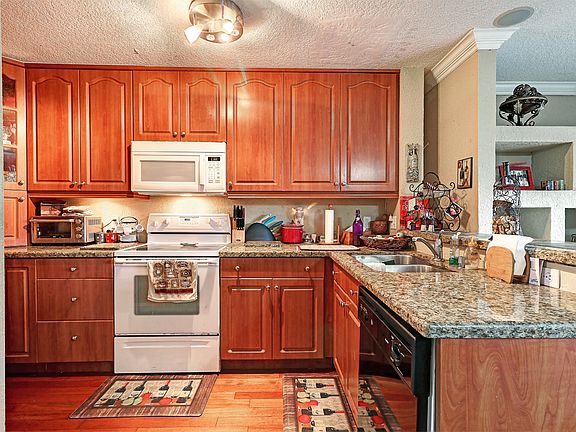 5th image of 10132 Royal Palm Blvd #302-B