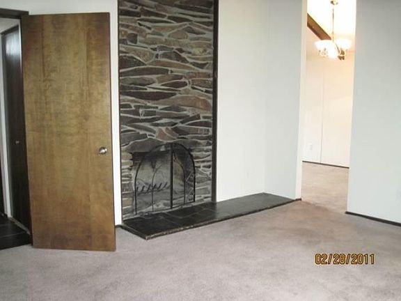 Family room, updated with dark hardwoods (not shown here)