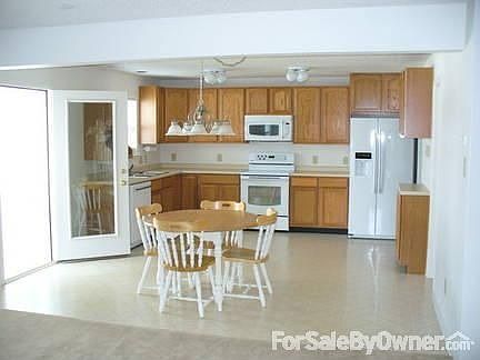 Kitchen : Eat-in kitchen upgraded with 6 more cabinets; has matching set of LG appliances.