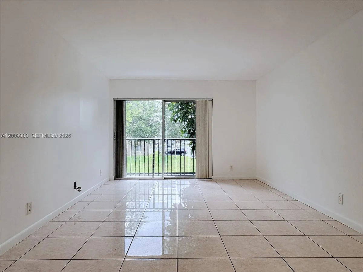Building Photo - 8550 N Sherman Cir #205