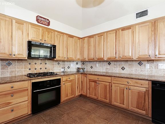 4th image of 9359 Village Green Way