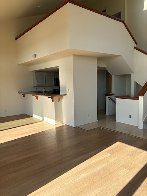 stairs to the open loft and then stairs to the bedrooms below