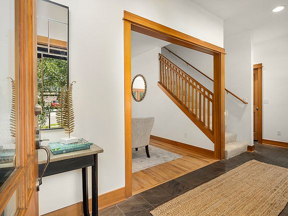 Front indoor entry has slate floors and a coat closet.