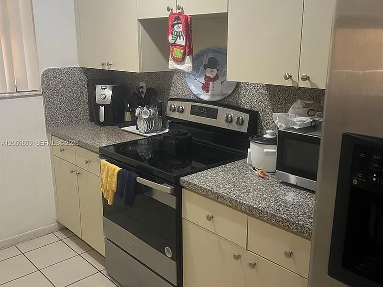 590 NW 114th Ave #101 — Photo 13