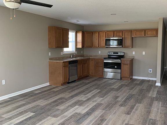 Vinyl flooring has been laid, ceiling fan is up and appliances are currently getting installed.