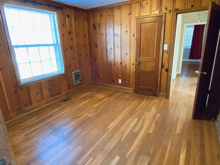 Original wood paneling - this room can be used as a bedroom or an office