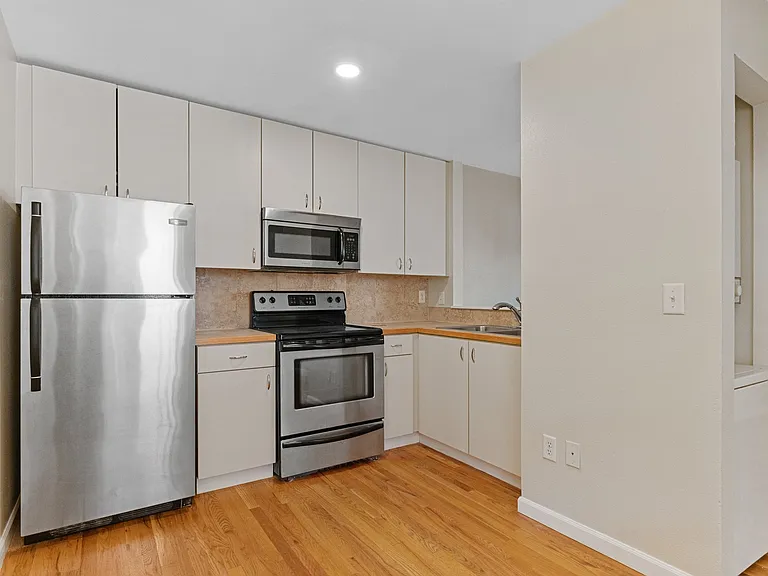 1940 W 32nd Ave #202 — Photo 5