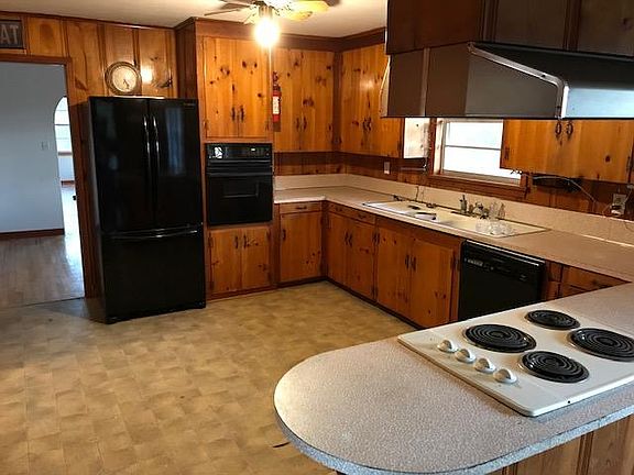 Big kitchen with stovetop, oven, and fridge