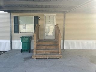 Front door carport and patio.