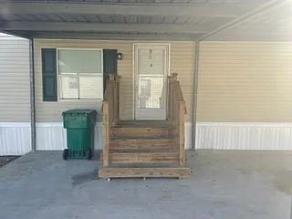 Front door carport and patio.