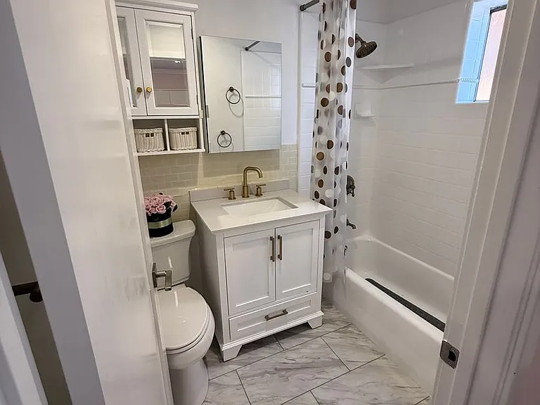 10610 Rhodesia Ave — Photo 12