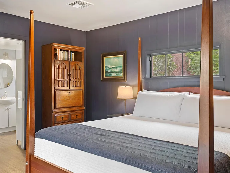 Master bedroom with king bed and en suite bathroom