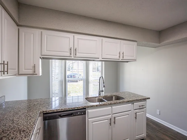 Kitchen with granite counters and modern cabinetry