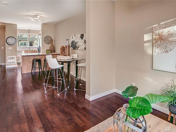 The open floor plan offers casual sophistication throughout, perfect for entertaining.  
